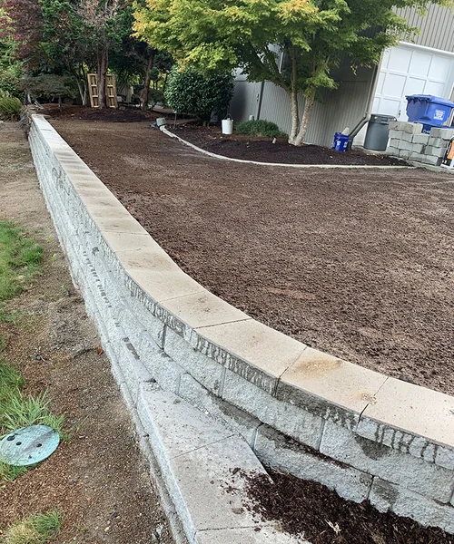 Retaining wall and new grass installation in Federal Way 